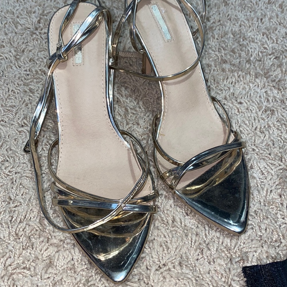 Golden high heels